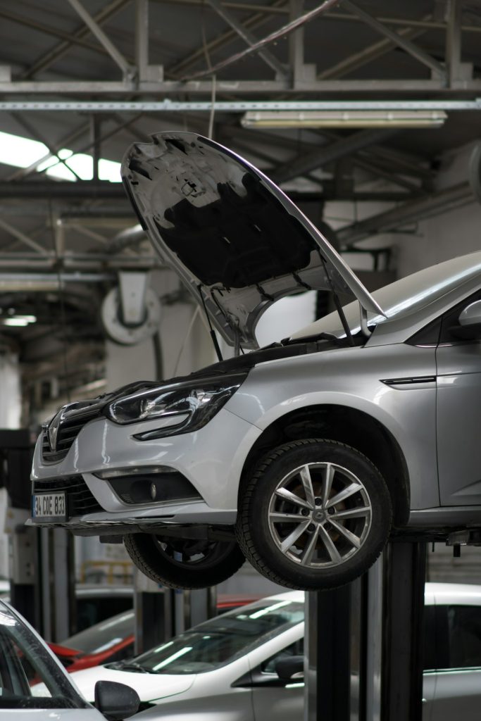 a-car-being-worked-on-in-a-car-repair-shop-ru-bvnfr8pq